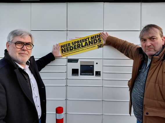 Actie_hier_spreekt_men_nederlands