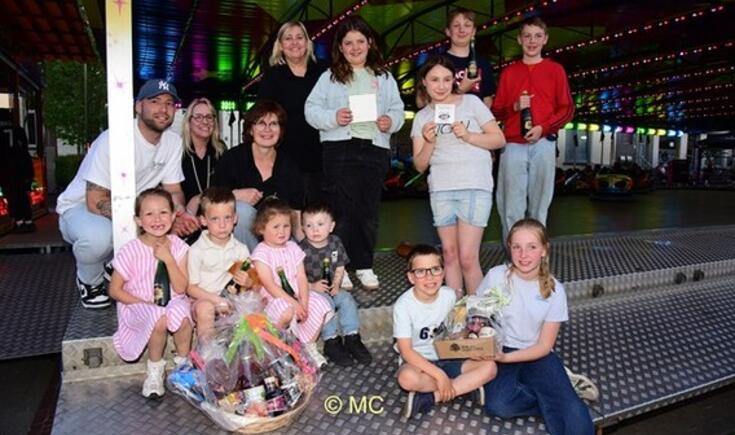 De winnaars van de Haantjesworp in Tollembeek. Foto Marc Colpaert